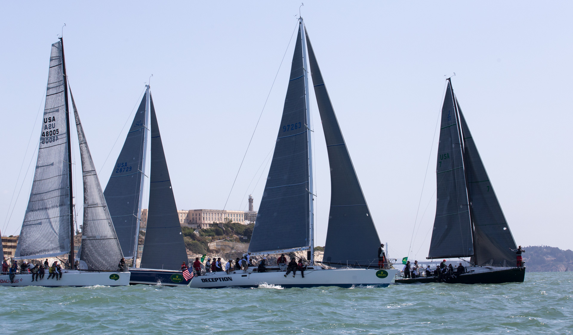 Different sizes of boats racing